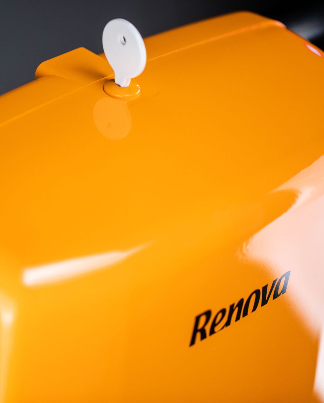 Orange Folded Towels Dispenser